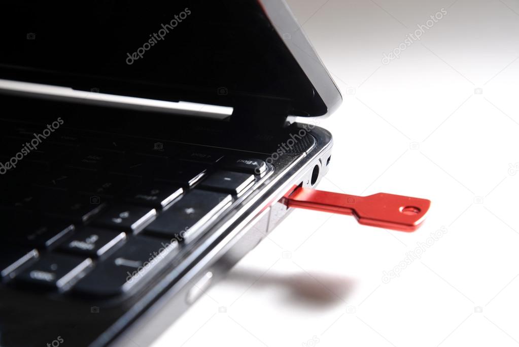 red usb key on black keyboard