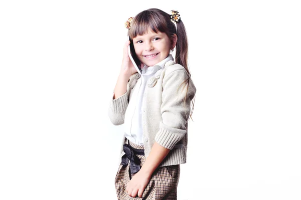 Tablet ile oynarken güzel küçük kız — Stok fotoğraf
