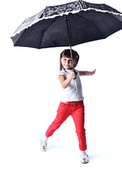 Kleines Mädchen mit einem Regenschirm — Stockfoto