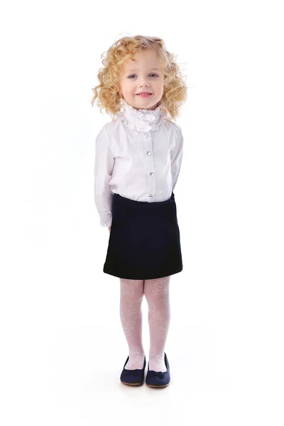 Porträtt av en liten flicka med glasögon isolerade en vit — Stockfoto