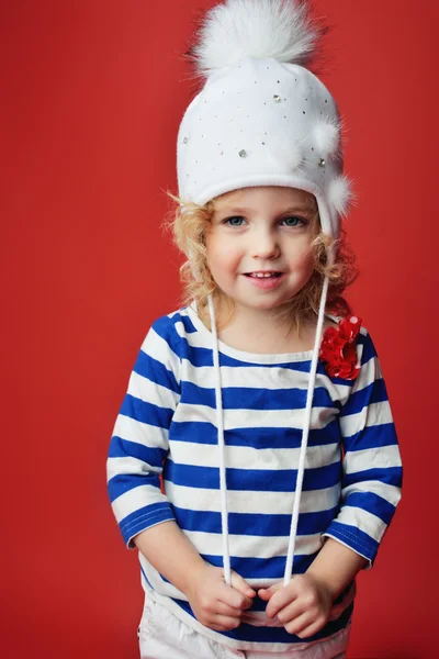 Portrait of a cute little girl in fashionable clothes. beautiful child — Stock Photo, Image
