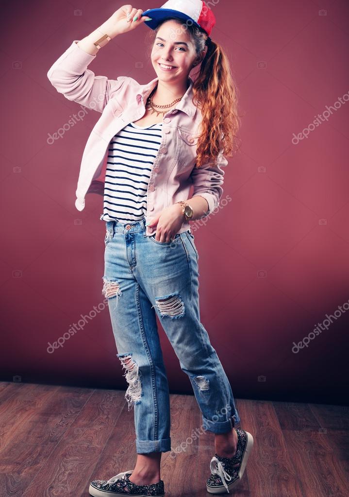 Sexy Hip Hop Woman In Cap With Long Red Hair Fashion Portrait Of
