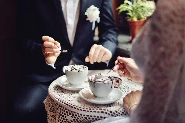 Emotional wedding couple in cafe having fun together. — Stock Photo, Image