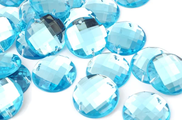 Blue rhinestone on white background — Stock Photo, Image