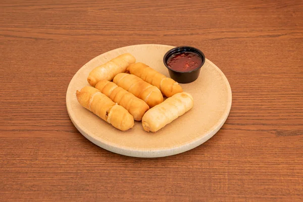 Breakfast Cheese Sticks Stuffed Banana Cheese Strawberry Syrup Beige Plate — Stok fotoğraf