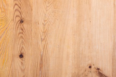 Çok belirgin damarları ve düğümleri olan masa üstü hafif bir tonda cilalanmış. Vektör ahşap doku arkaplanı