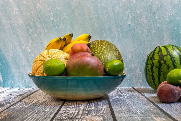 Blue Bamboo Tray Fresh Seasonal Fruits Piel Sapo Melons Mangoes — Stock Photo, Image