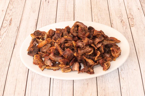 Fried pork ear tray served in Spanish tapas restaurant