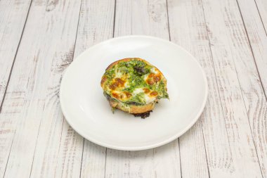 The contrast of flavors in a bite: a macro photograph capturing the precise moment an empanada is opened, releasing its aroma and revealing its juicy interior