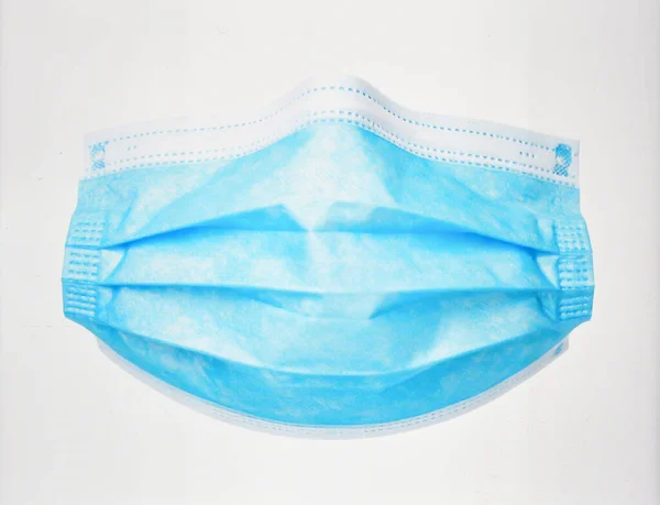 Mavi Tek Kullanılabilir Tıbbi Yüz Maskesi Beyaz Arkaplanda, Virüs ve Kirliliğe Karşı Sağlık ve Koruma Ekipmanı İzole Edildi