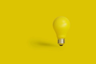 Sarı arka planda sarı ampul. 3d illüstrasyon.