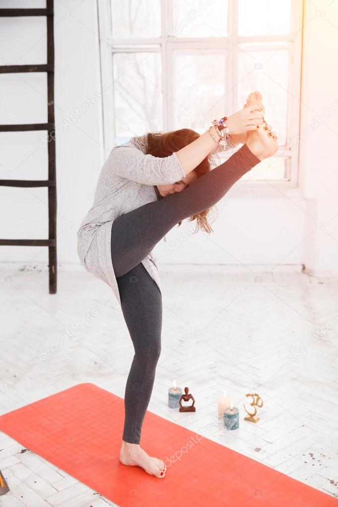 Woman having yoga practice.