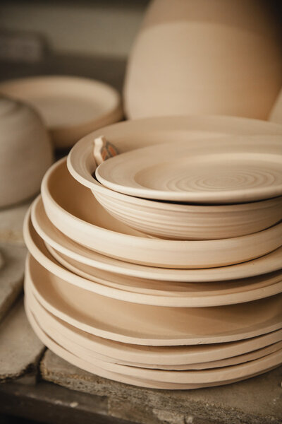 Roasted ceramic plates without glaze closeup