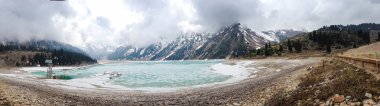Wide panorama of Big Almaty Lake in Kazakhstan