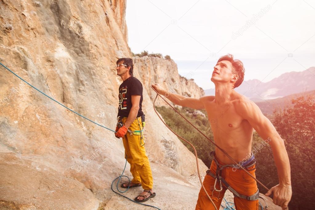 Two rock climbers on the cliff