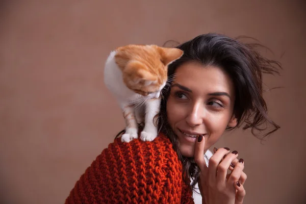 Little kitten on woman shoulder Royalty Free Stock Images