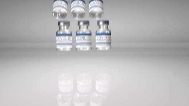 Şişe koronavirüs aşısı COVID-19. İçinde sars-cov-2 aşısı olan cam şişeler. Video düzenleme için pürüzsüz 3d döngü, video düzenleme için döngü, döngü — Stok video