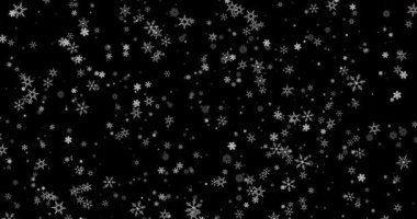 Büyüleyici Kış Harikalar Diyarı: Düşen Kar Tanelerinin Güzel Döngüsü Karanlık Bir Arkaplana Karşı Sihirli Bir Atmosfer Yaratıyor. Yüksek kalite 4k görüntü