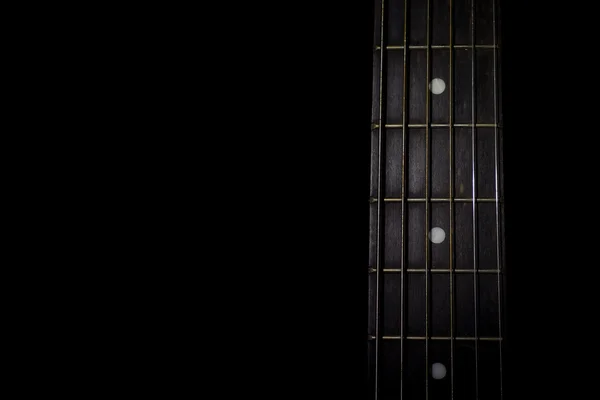 Guitar neck isolated on black background — Stock Photo, Image