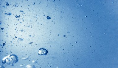 Kaynamış su kabarcıkları arka plan ile