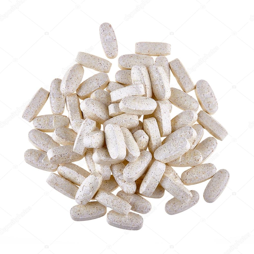 Heap of nutritional supplement pills isolated on white