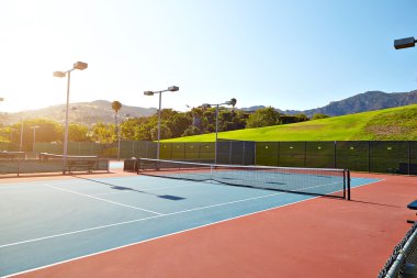 Outdoor tennis court with nobody in Malibu clipart