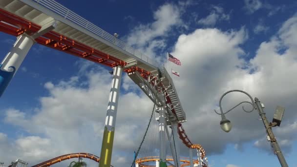 Flag fluttering in the wind on the rides — Stock Video