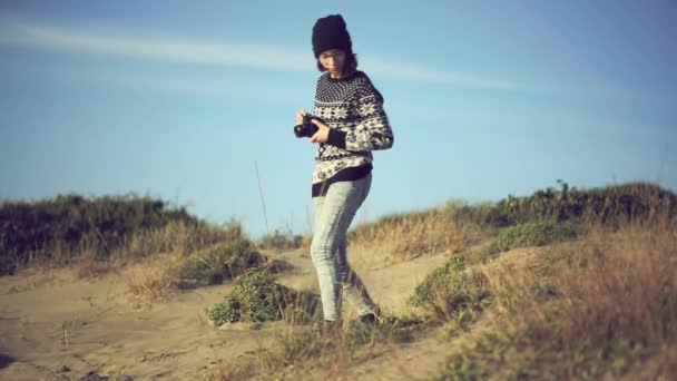 Girl taking photo with  film camera — Stock Video