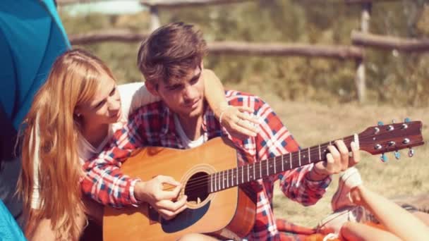 Man Playing Guitar At Camp — Stock Video