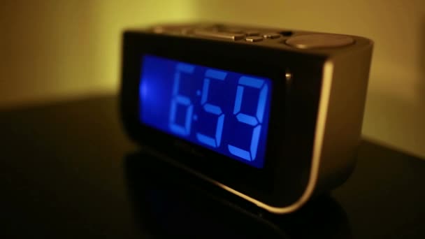 Hand turning off alarm clock — Stock Video