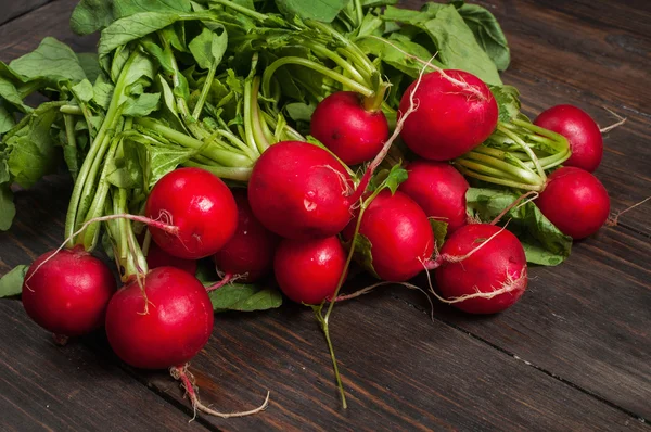 Fresh radish on old wooden table. Radish background. Rustic Style — Stock Photo, Image