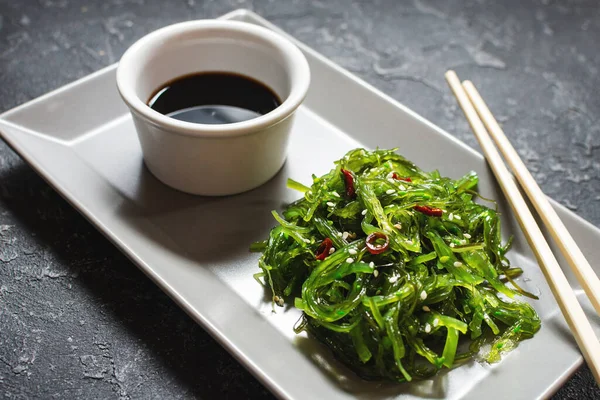 Wakame Seaweed Salad Sesame Seeds Chili Pepper Bowl Black Stone — Stock Photo, Image