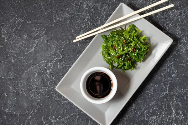 Wakame Seaweed Salad Sesame Seeds Chili Pepper Bowl Black Stone — Stock Photo, Image