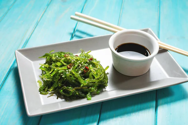 Wakame Seaweed Salad Sesame Seeds Chili Pepper Bowl Blue Wooden — Stock Photo, Image