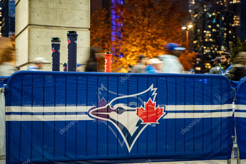 Close up of Blue Jays logo barrier outside Rogers Centre at night. Toronto, Canada - October 20, 2025.