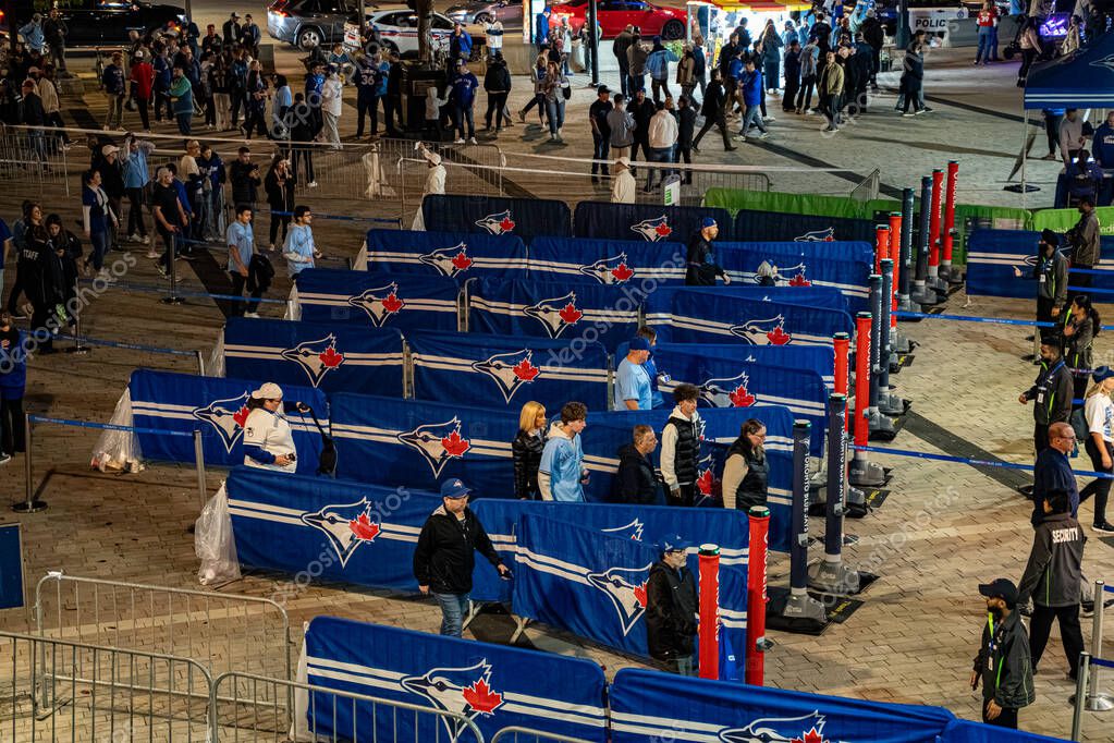 Close up of Blue Jays logo barrier outside Rogers Centre at night. Toronto, Canada - October 20, 2025.