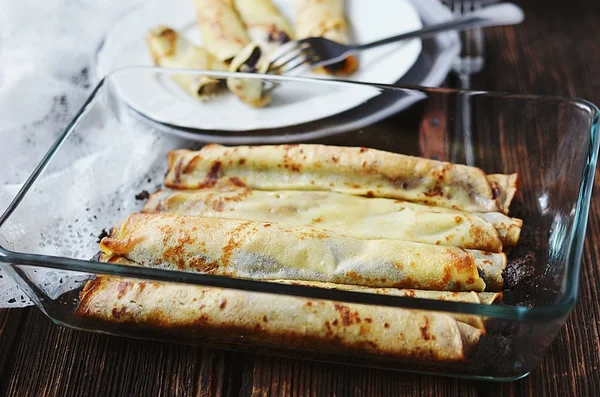 Pancakes filled with poppy and honey — Stock Photo, Image