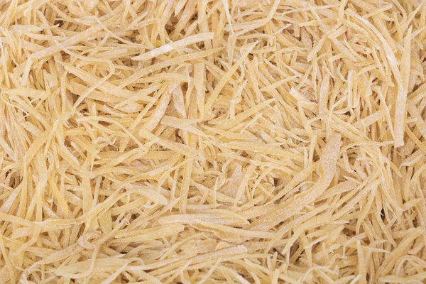 Primer plano de fondo de textura de fideos caseros —  Fotos de Stock