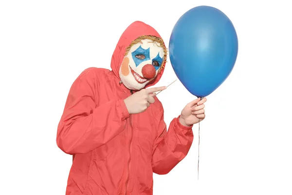 Clown in een rode jas — Stockfoto