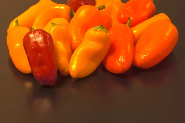 Red, yellow, orange colorful healthy organic peppers — Stock Photo, Image