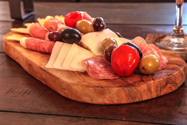 Charcuterie Board Rustic Wood Candles Spread Prosciutto Mozzarella Cheese Genoa — Stock Photo, Image