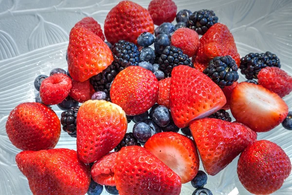 Mixed Berry Background Includes Red Strawberries Blue Berries Red Raspberries — Stock Photo, Image