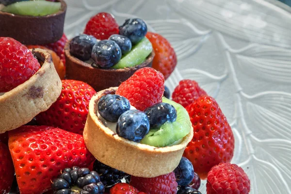 Fruit Tarts Top Mixed Berry Background Includes Red Strawberries Blue — Stock Photo, Image