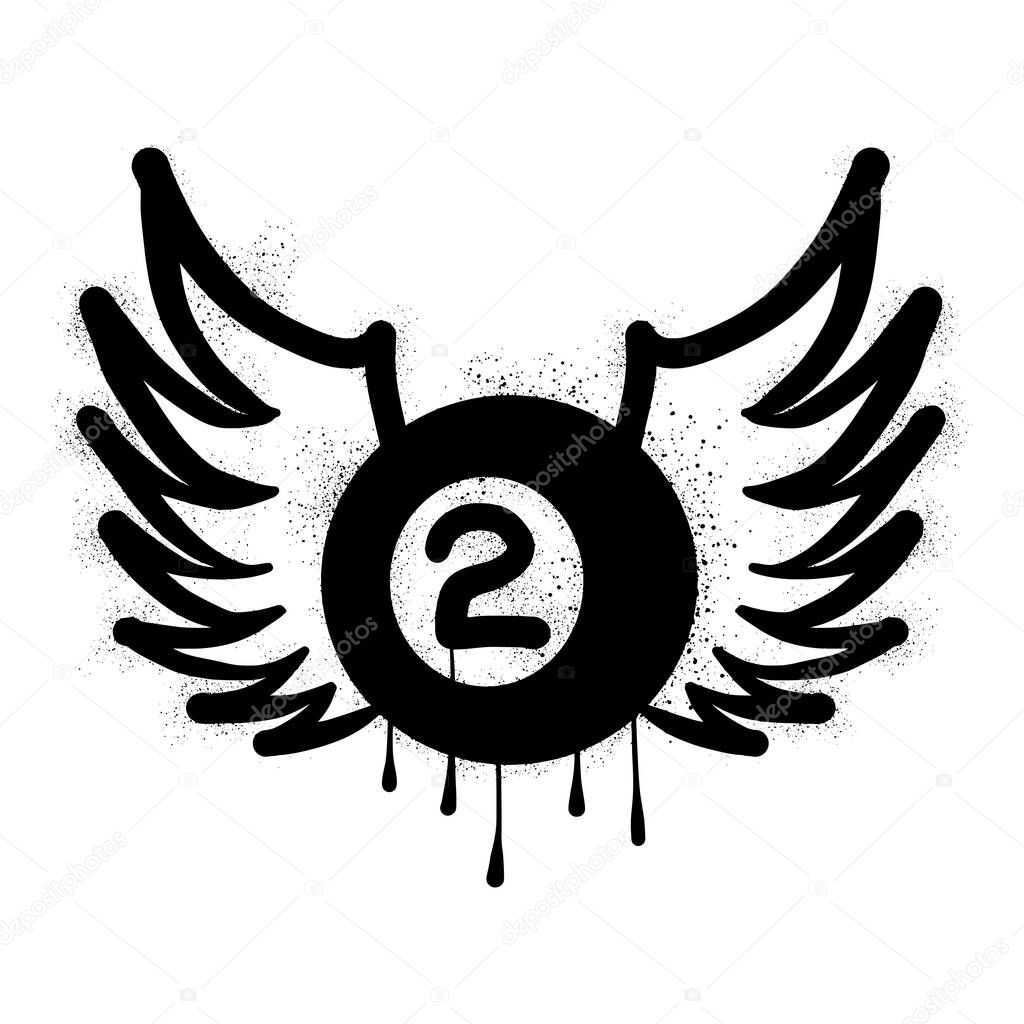 Billiard ball wings drawn in black spray paint graffiti style