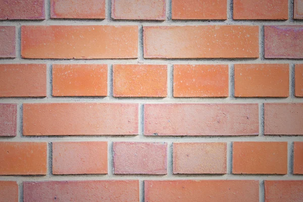 Tekstura ściany z czerwonej cegły na tle. — Zdjęcie stockowe
