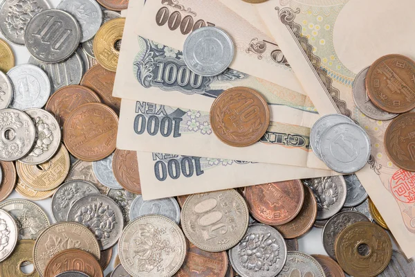 Notas e moedas de iene japonês. conceito de financiamento . — Fotografia de Stock