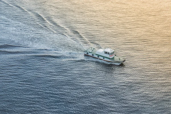 Speed boat on the sea at sunset time. — Stock Photo, Image