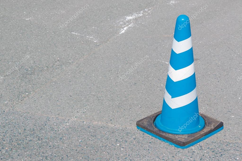 Traffic cones painted in blue and white. — Stock Photo © nonhanon 91255858