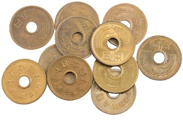 Hög med 5 yen mynt japanska pengar. — Stockfoto