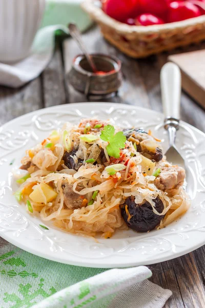 Stewed cabbage with meat and prunes — Stock Image Stewed cabbage with meat and prunes Royalty Free Stock Images